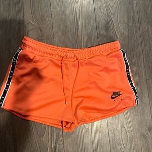 Coral pink Nike air shorts. Size large women